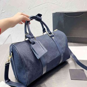 Duffle Bags Luxurys Designer Sacs Grande Capacité Classique Femmes Sacs De Voyage Bagages Mode Denim Sac À Main Femme 220727