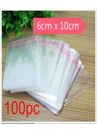 Duurzame 100 pit Selfadhesive Clear cellofaanzak Zelfafdichting Kleine plastic zakken voor snoepverpakkingskoekverpakkingszak Pouch1210202