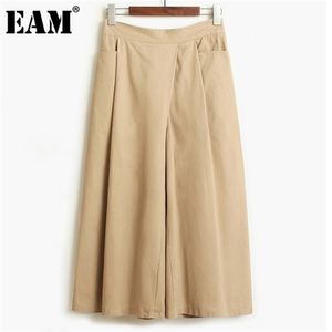 [EAM] poches asymétriques haute élastique jambe large taille pantalon ample longueur cheville pantalon femmes marée printemps été 2021 1DD8198 Q0801