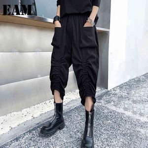 [EAM] Hoge elastische taille zwart geplooide pocket casual broek losse pasvorm broek vrouwen mode lente zomer 1DD8269 210512