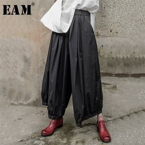 [EAM] nouveau printemps automne taille haute élastique noir plissé fendu Joint jambe large pantalon ample femmes pantalon mode JX100 201118