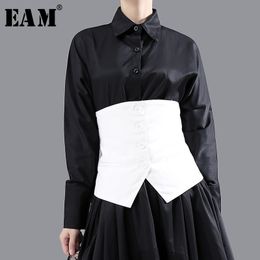 EAM -vrouwen losse fit zwarte asymmetrische knop split Joint Vest Mouwloze mode Spring herfst 1N839 201031