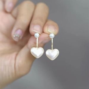 Diseñador de aretes para mujer Pendientes de trébol de cuatro hojas Pendientes perforados en forma de corazón Alto pulido Estilo clásico Mujeres regalos de fiesta de bodas