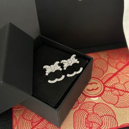 Oorbellen boetiek 925 verzilverde earstuds merkontwerpers bowtie ontwerp romantische liefde cadeau earstuds hoogwaardige diamant charme meisje hoge kwaliteit earstuds