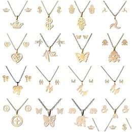 Boucles d'oreilles Collier 16 styles en acier inoxydable 316L Ensembles de bijoux Couronne Skl Papillon Elephant Coeur Pendentif Collier Boucle d'oreille Ensemble pour Wo Dh8Je