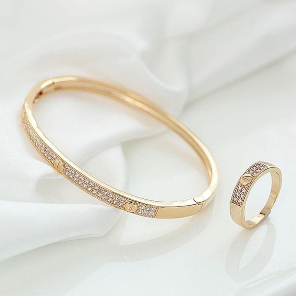 Conjunto de pulsera y anillo con diseño de collar y pendientes para mujer, brazalete clásico de alta moda, tornillo de cobre, joyería Simple de moda