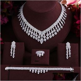 Oorbellen Ketting Set Luxe Kubieke Zirkonia Kwastje Bruid Drop Armband En Ring 4 Stuks Dubai Fl Sieraden Voor Bruidslevering S Dhgarden Dhtok