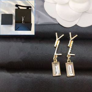 Boucles d'oreilles Boucles d'oreilles de créateur originales avec breloque tampon, boucles d'oreilles pendantes Boutique pour femmes, cadeau d'anniversaire, bijoux plaqué argent, style de luxe, cadeau avec boîte