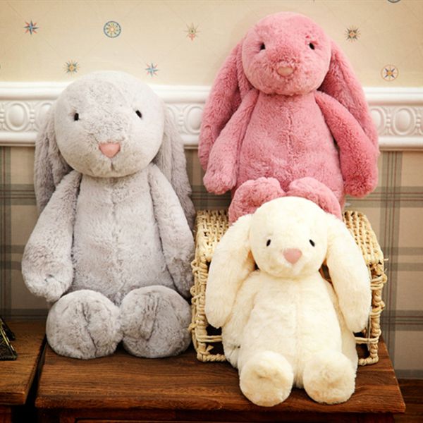 Pâques de lapin de Pâques réconforte la poupée de lapin jouet en peluche à oreille à oreilles