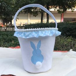 Suministros para fiestas de Pascua, cesta de mano decorativa, cestas de cola de conejo de peluche impresas, bolsa de lona de encaje, bolsa de regalo de dulces, venta al por mayor