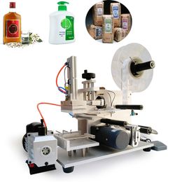 Machine d'étiquetage manuelle simple et économique pour bouteilles rondes