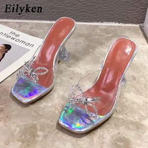 Eilyken Fashion Femmes Slippers Transparent Talons hauts Sandales Sexy Square Toe Rimestone Bowknot Wedding Party Chaussures 240409