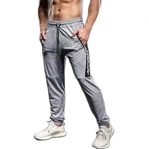 Pantalons de jogging élastique Men de course plus taille avec une fermeture à glissière Sports Fitness Collons de gym