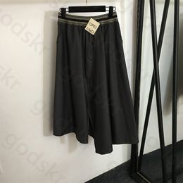 Taille élastique jupe asymétrique des femmes designer mi-jupe de la jupe sexy robes de fente d'été sexy