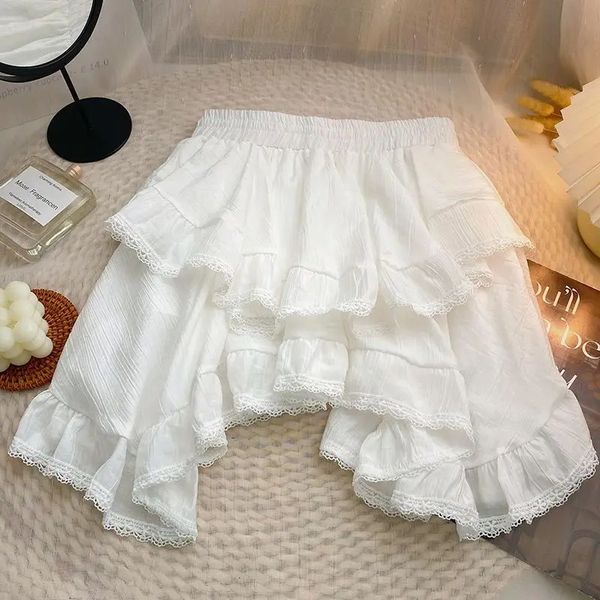 Cintura elástica blanca blanca irregular mini kawaii falda escolar japonés y2k estufa ruffles cortos de falda mujer streetwear 240419