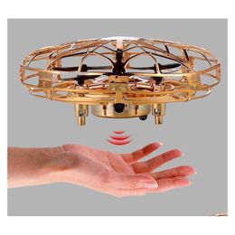 Elektrisch/RC Aircraft EMT MN2 4AXIS UFO Inductie Toy Gsture Sensing Drone Colorf Lights USB Laad Bescherming Kid Kerstgeboorte Dhsyj