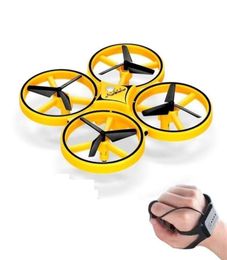 Gesto de aeronave elétrica RC Voando Mini Drone Relógio dron Quadcopter de indução interativa relógio inteligente controle remoto LED li7021871