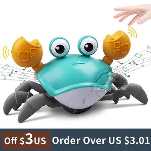 Électrique/RC Animaux rampant crabe bébé jouets avec musique LED s'allument pour enfants tout-petit jouet interactif avec éviter automatiquement les obstacles jouets musicaux 230512
