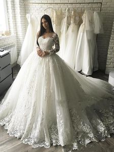 Élégant A Ligne Robes de mariée robe de bal sur le cou transparent des appliques à manches longues et corset arrière en tulle