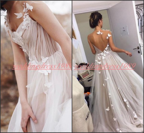 Robes de mariée de plage dos nu de pays élégant avec papillon A-ligne 2020 jardin tulle robes de mariée arabes pour la mariée africaine plus la taille balle