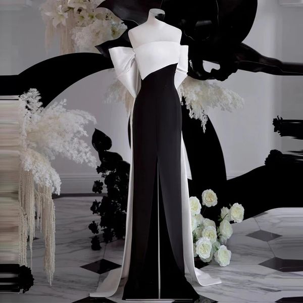 Vestido de noche elegante 2024 Apliques de lazo Sin espalda Sirena Sin tirantes Longitud del piso Negro Blanco Raja lateral Vestidos de fiesta de graduación formales para mujer Robe De Soiree por encargo