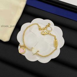 Elegante hartletter Ketting Bracelet Luxe Oorspronkelijke ontwerper Women Charm Pendanten 18K Goud Gold Verzilde polsband manchet Keten Bangle Fashion Sieraden