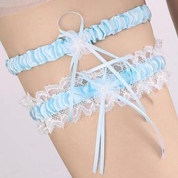 Garter en dentelle élégante pour les mariées avec de petits fleurs d'arc