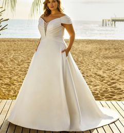 Elegantes y longos altos con cuello de hombro Vestidos de novia de talla grande A-Línea Vestido de marfil Satin de Novia Botones cubiertos Botones Back Bridal Gowns for Women