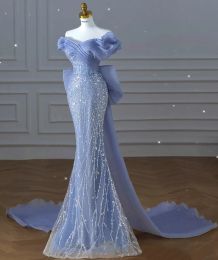 Élégants longues robes de soirée bleu hors de l'épaule à paillettes sans manches perlées avec une gaine d'arc sirène robe de fête de fête de train pour femmes