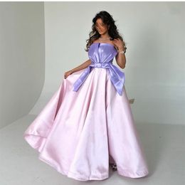 Elegante lange roze satijnen geplooide avondjurken met boog A-lijn mouwloze Midden-Oosten vloerlengte Zipper Back Prom-jurken voor vrouwen