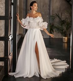 Robes de mariée élégantes longues en tulle chérie perlée a-ligne sans manches ivoire balayage train robe de mariée à lacets dans le dos robe de mariée robes pour femmes