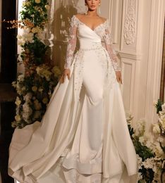 Eleganti abiti da sposa a sirena maniche lunghe scollo a V profondo pizzo applicazioni di raso paillettes perline lunghezza del pavimento treno staccabile perla abiti da sposa eleganti abiti da sposa