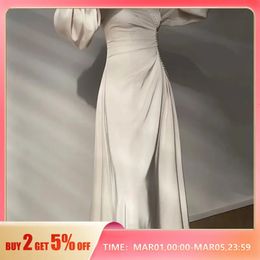 Robe minimaliste élégante col en v manches lanternes taille haute autocollants perle solide jupe longue plissée vêtements pour femmes 240313