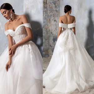 Élégant hors épaule une ligne robes de mariée avec des volants paillettes tulle robe de mariée appliques plus la taille robe de mariée sur mesure 2022 plus récent