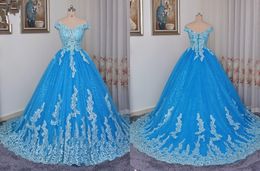 Elegant off-schouders blauwe quinceanera jurken v-hals korte mouw applique kant lovertjes stof tule corset terug goedkope prom sweet 16 jurk
