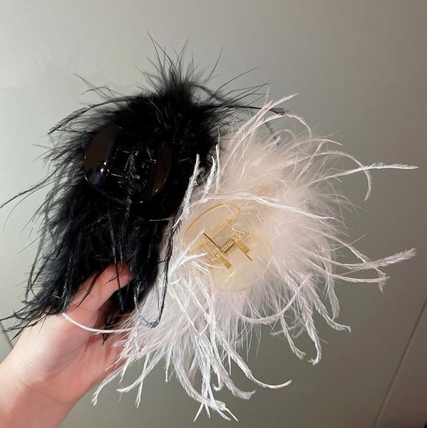 Pinzas elegantes para el pelo de plumas de avestruz para mujer