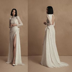 Elegante prom jurk uniek ontwerp hoge kraag lange mouwen lange mouwen backless glanzende voorkant split court jurk op maat gemaakte formele dubai jurk plus size gewaden