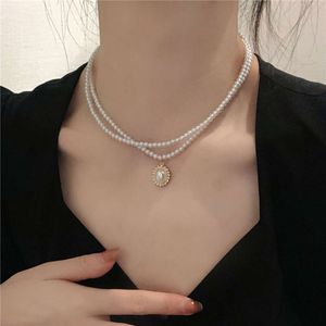 Elegante retro Franse dubbellaagse parelketting voor damessleutelbeenketting, minimalistisch en niche-design nekornament