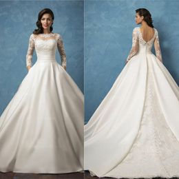 Robes de mariée en satin élégant transparent à manches longues