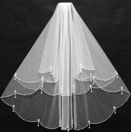 Elegant Short Ivory Bridal Veils perle les volants de bord avec un peigne insert pas cher pour les mariées de mariage 110386382666