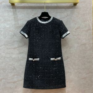 Elegante kleine geurige stijl jurk 2024 vroege lente nieuwe dames A-lijn handgemaakte pailletten dikke tweed dames mini rok