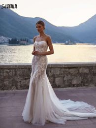 Elegante vestido de novia sin tirantes con lentejuelas brillantes de novia de la sirena.