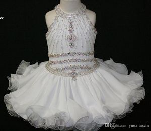 Elegante magdalena blanca Vestidos para niños pequeños Vestido de princesa con cuentas Halter Primera comunión Vestidos cortos de niña de las flores para el banquete de boda