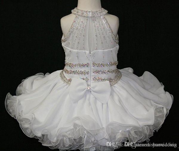 Elegantes vestidos blancos del desfile del niño de la magdalena Vestido de princesa con cuentas halter Primera comunión Vestidos cortos de niña de flores para Wedding271k