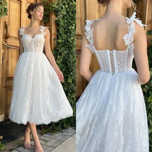 Elegante witte homecoming-jurken Spaghetti lieverd kant promfeestjurk theelengte homecoming-jurk A-lijn
