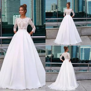 Elegante witte prinses trouwjurken met sieraad hals 3/4 lange mouwen kant applicaties landelijke bruidsjurken zak satijn vestido de novia