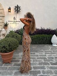 Femmes élégantes Lace Lace Lace Leopard Robes maxi robes longues mode Backless sans manches robes de fête féminine Vestido 240420