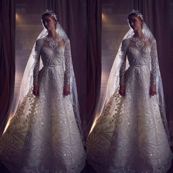 Elie Saab 2019 Diseñador Vestidos de novia Encaje Apliques Joya Cuello Manga larga Con cuentas Playa Una línea Vestidos de novia Brillante robe de mariée