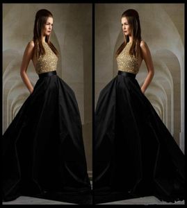 Robes de soirée Elie Saab 2016 Superbes paillettes dorées et jupe noire licou contre les robes de soirée officielles balayez les robes de bal de train3827392