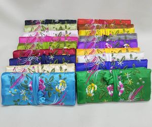 Bordado Floral Maquillaje Envoltura Joyería Rollo Bolsa de almacenamiento de viaje Collar Pendiente Anillo Bolso de embrague Seda Mujeres Cremallera Bolsas de cosméticos Bolsa de regalo